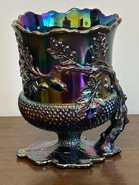 MOSSER GLASS CO. PURPLE IRIDESCENT FOOTED SPOONER WITH LEAVES ACORN AND BRANCH